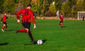 Teens playing football